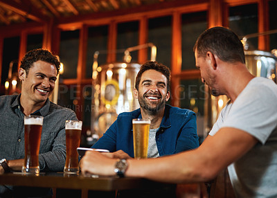 Buy stock photo Men, smile and relax with beer at pub for social gathering, communication and bonding on weekend. Friends, discussion and conversation with alcohol beverage for happy hour, drinks or reunion together