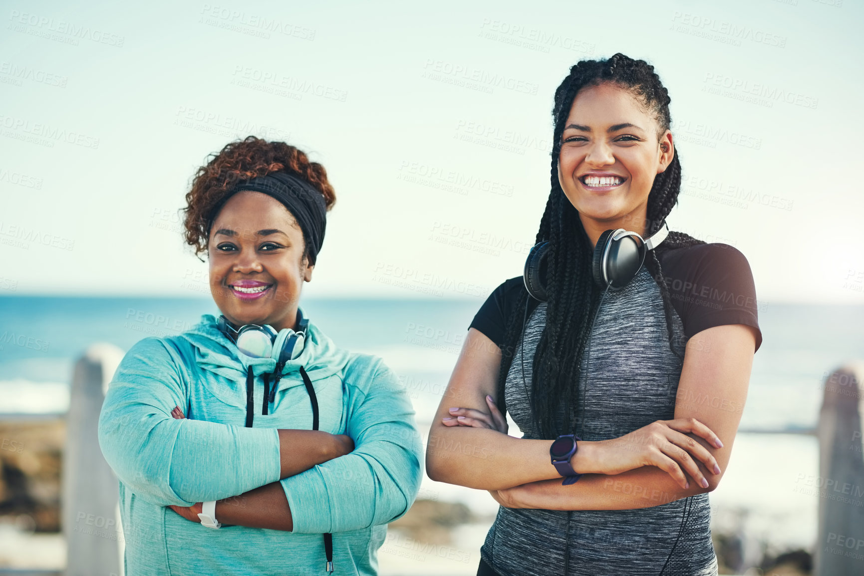 Buy stock photo Portrait of two sporty young women standing on the promenade