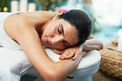 Buy stock photo Woman, sleeping and beauty in spa for wellness, resting and relaxation in hotel resort for self care service. Comfortable, massage table and peaceful female client, zen and pamper and body treatment