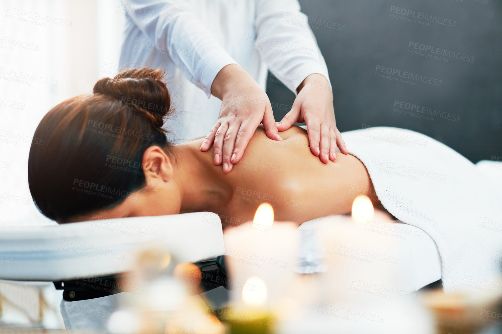 Buy stock photo Shot of a young woman enjoying a beauty treatment at a spa