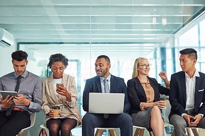 Buy stock photo Business people, row and waiting room with technology for job search, career opportunity or line at office. Young, group or employees on chairs with laptop, tablet or phone for company offer together