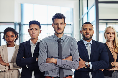 Buy stock photo Shot of a group of confident and diverse young businesspeople working together in a modern office