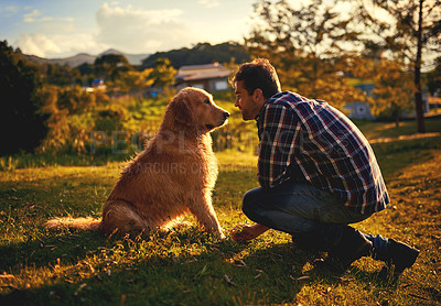 Buy stock photo Care, dog and man in park, nature and relax with golden retriever, bonding and together. Outdoor, pet and person with smile, holiday and vacation with animal, water and travel in woods, lake and trip