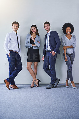 Buy stock photo Portrait of a diverse group of businesspeople standing against a grey background