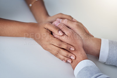 Buy stock photo Holding hands, sympathy and couple in home with unity for conversation in marriage repair together. Love, care and closeup of people with empathy, partnership and trust for counseling with commitment