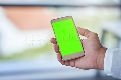 Buy stock photo Cropped shot of a businessman using a mobile phone with a green screen in a modern office