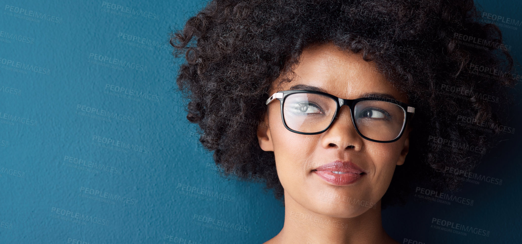 Buy stock photo Optometry, vision and female model with glasses in studio with thinking, pensive or idea face expression. Optical wellness, healthcare and African woman with spectacles by blue background with mockup