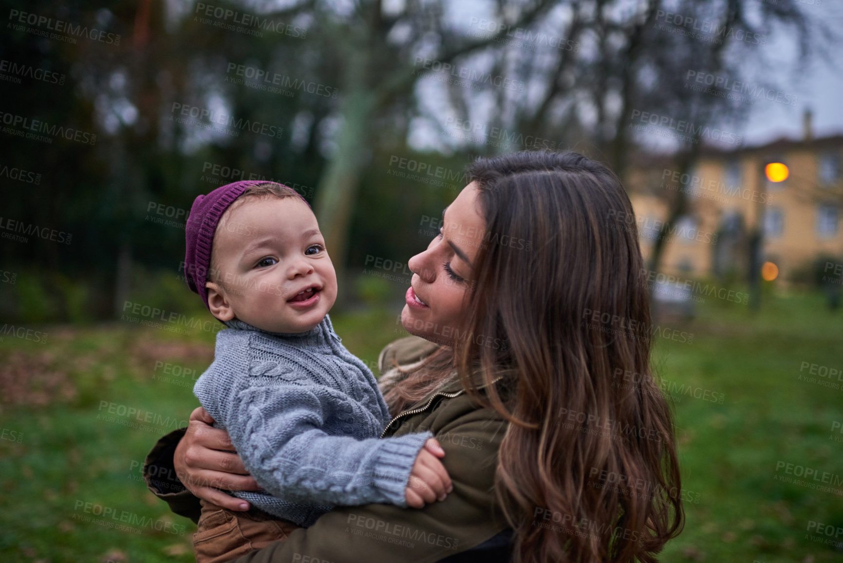 Buy stock photo Mother, baby and child outdoor for love, support and care with foster parent at night. Mom, kid and bonding with infant at park for connection, development and family play together for relationship