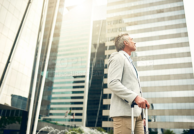 Buy stock photo Mature, businessman and walk with luggage, city and thinking as real estate agent. Male person, suitcase and morning commute for accommodation, travel and career in property market evaluation in USA