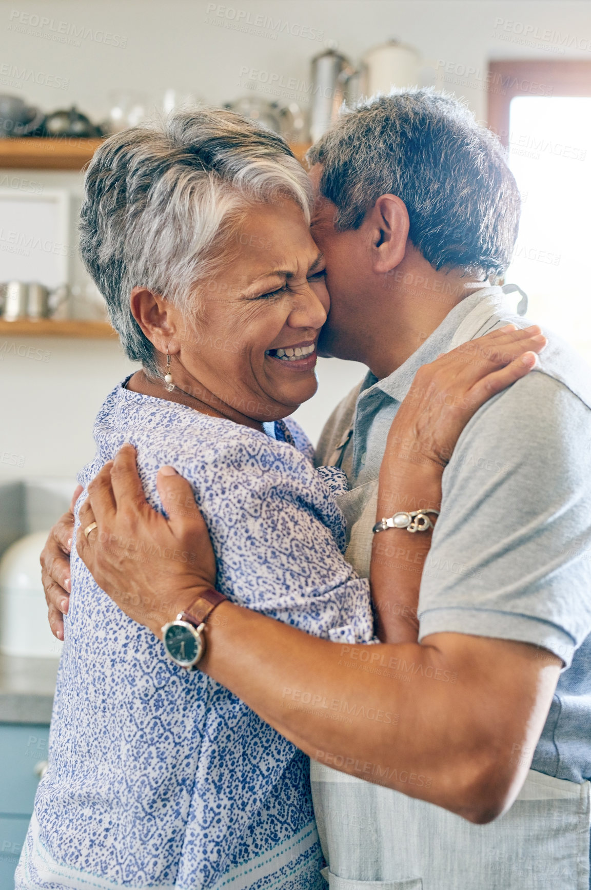 Buy stock photo Cropped shot of a mature couple dancing in the kitchen