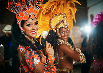 Buy stock photo Carnival, portrait and women with costume for dancing, celebration and expression of Brazilian culture. Festival, people or tradition with dancers for performance, creativity or energy in music event