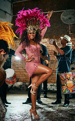 Buy stock photo Full length portrait of a beautiful samba dancer performing in a carnival with her band
