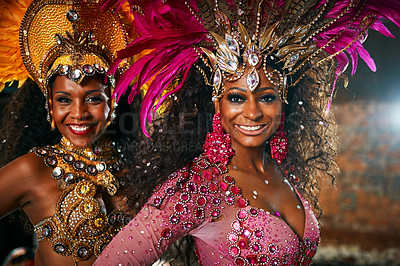 Buy stock photo Festival, women and portrait with costume for dancing, celebration and expression of Brazilian culture. Carnival, people or tradition with dancers for performance, creativity or energy at night event