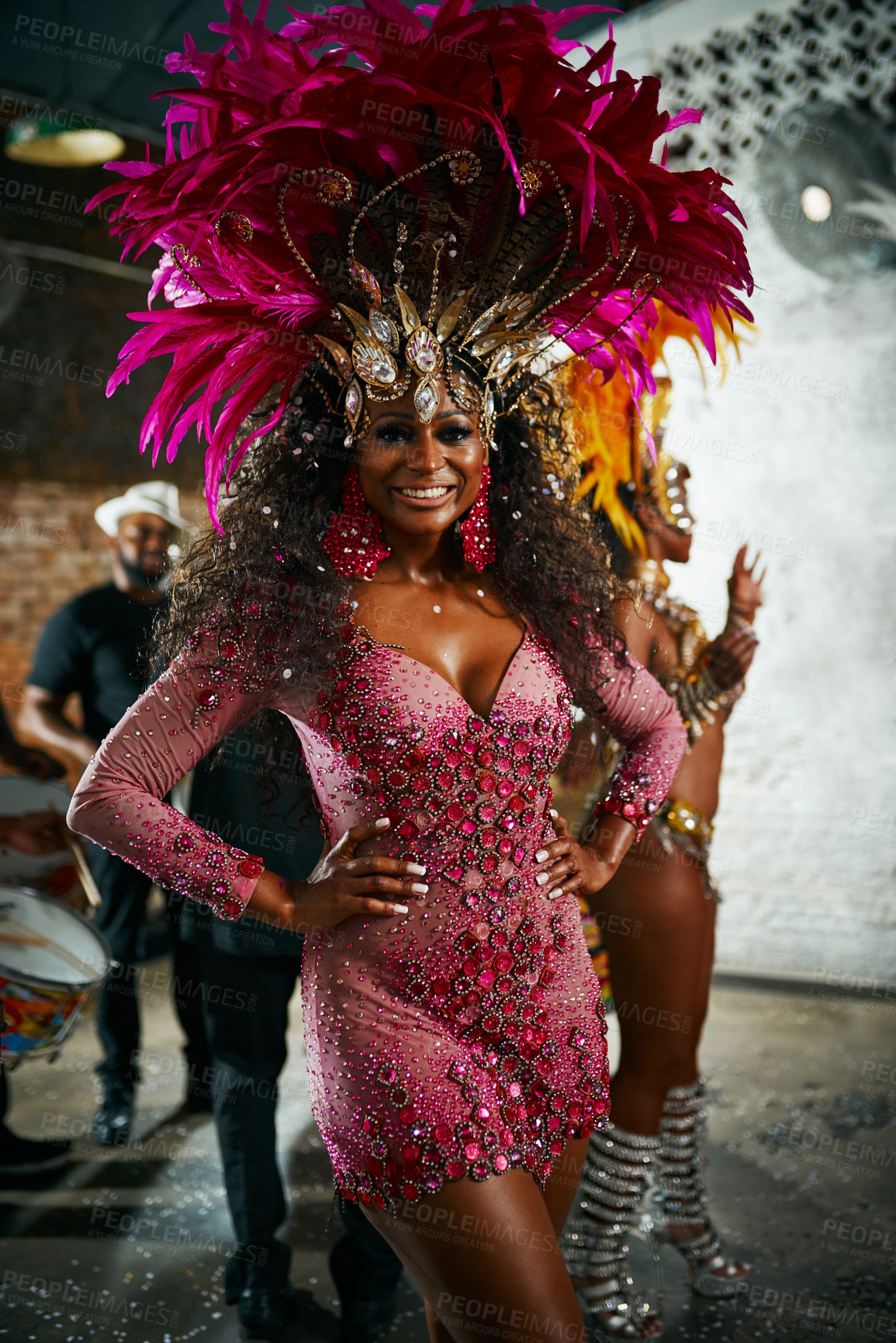 Buy stock photo Cropped portrait of a beautiful samba dancer performing in a carnival with her band
