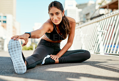 Buy stock photo Woman, portrait and fitness with leg for stretching in city preparation for workout, exercise or outdoor training. Active, female person or runner in warm up or getting ready for muscle flexibility