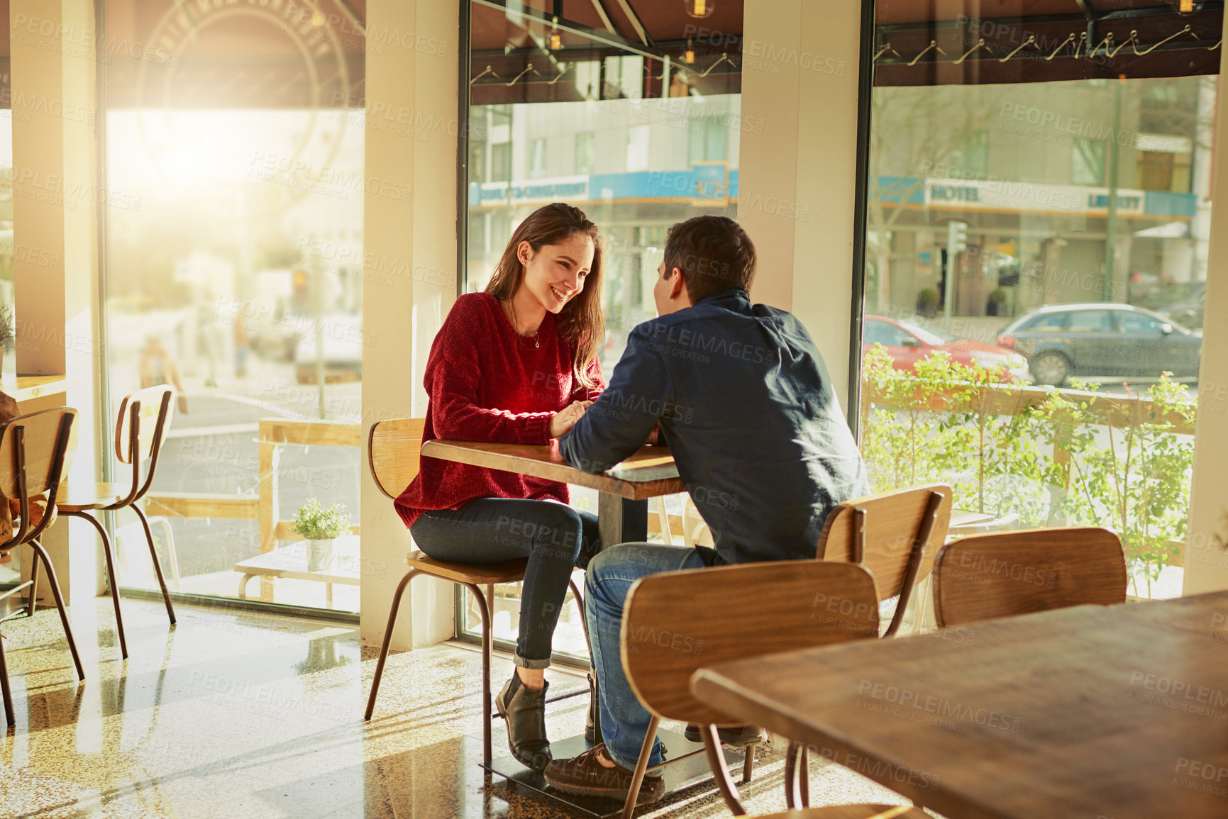 Buy stock photo Couple, relax and holding hands on date at cafe for valentines day, romantic celebration and commitment. Happy, people and support with relationship trust, loyalty and bonding together at restaurant