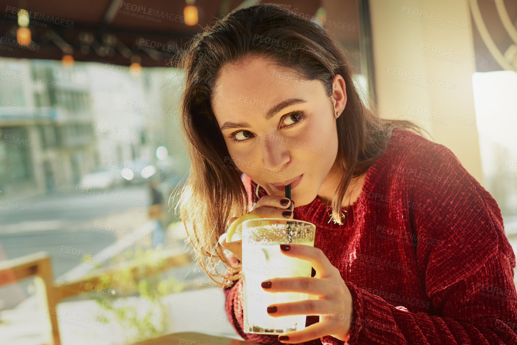 Buy stock photo Glass, lemonade and smile of woman in coffee shop for break, relax or wellness on weekend. Beverage, enjoyment and thinking with happy customer person in cafe or restaurant for morning time off