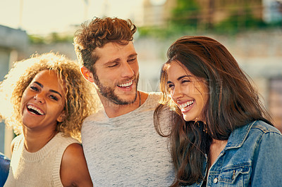 Buy stock photo Cropped shot of young friends spending the day outside