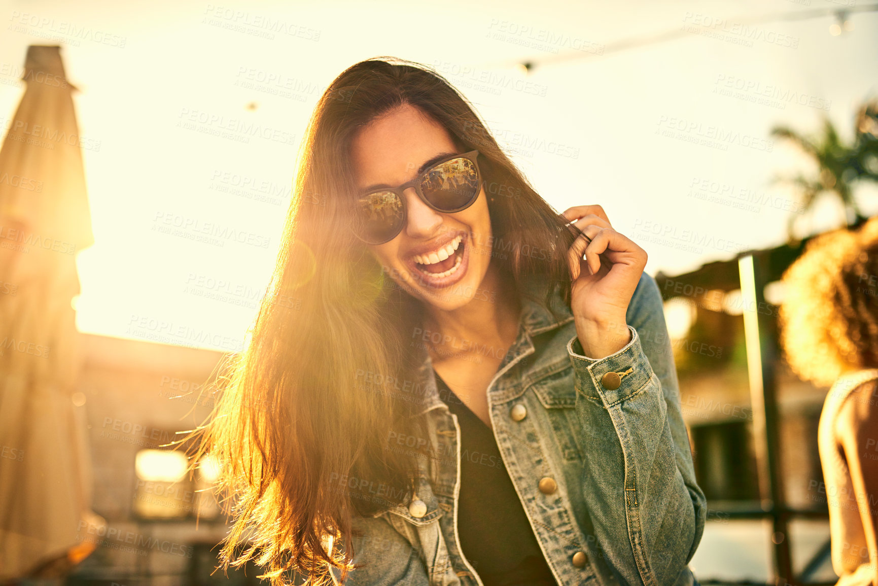 Buy stock photo Portrait of an attractive young woman spending the day outside on a rooftop