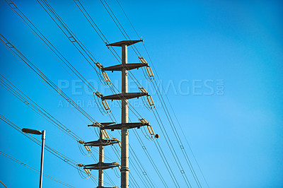 Buy stock photo Shot of a pylon against a blue sky