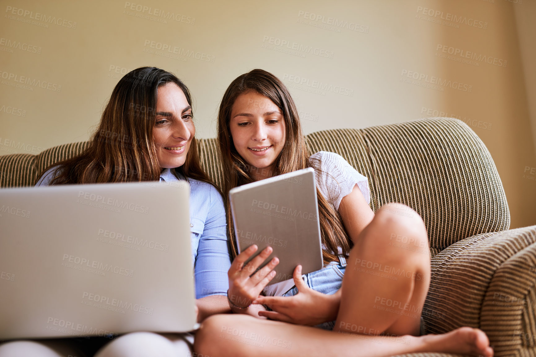 Buy stock photo Tablet, laptop and mom with child on sofa for online learning, watching movies and internet videos. Family home, living room and mother with girl on digital tech for games, remote working and website