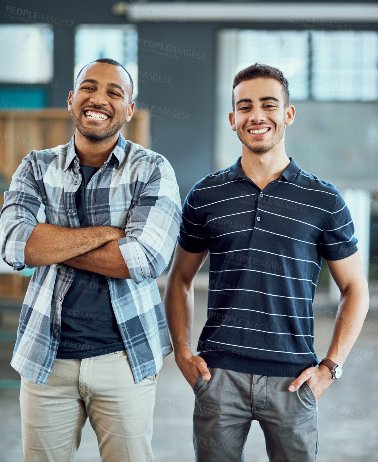 Buy stock photo Portrait of two young designers standing in an office