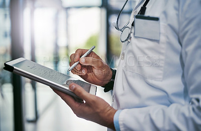 Buy stock photo Cropped shot of a young medical practitioner working in a hospital