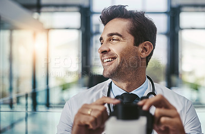 Buy stock photo Medicine, microscope and thinking with man in hospital for breakthrough, discovery or experiment. Healthcare, smile and vision with happy doctor in clinic for cure, drug trial or medical research