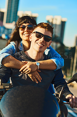 Buy stock photo Cropped shot of a young couple out for a ride in the city