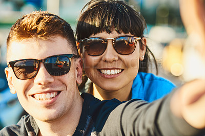 Buy stock photo Outdoor, couple and happy on selfie with sunglasses for bonding, love and support in Italy. People, relationship and smile or satisfied for social media, post and profile picture with care or trust