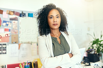 Buy stock photo Cropped shot of a designer standing in her office