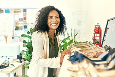 Buy stock photo Small business, woman and smile with shoes as fashion designer with pride at boutique. Female person, entrepreneur and happy on portrait with confidence at workshop for creativity and collection