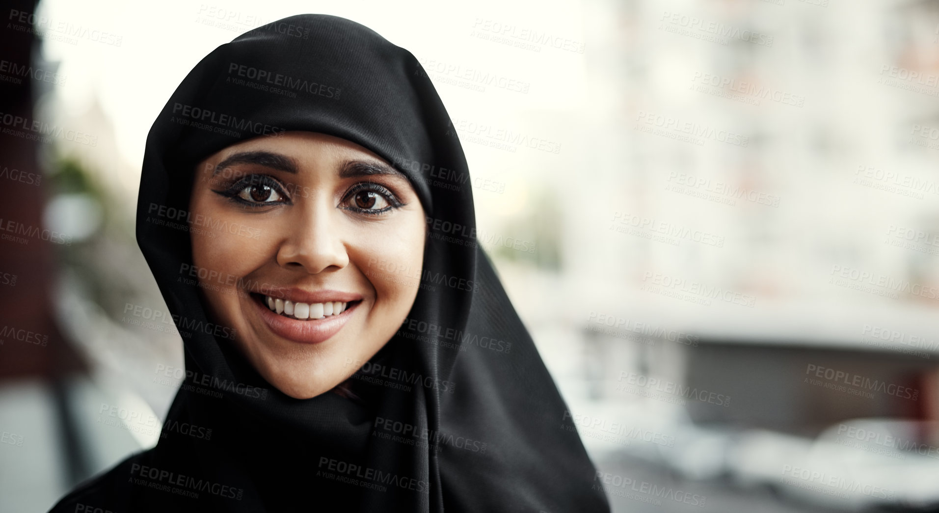 Buy stock photo Cropped portrait of an attractive young businesswoman dressed in Islamic traditional clothing standing on her office balcony