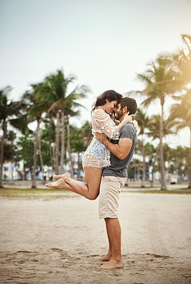 Buy stock photo Honeymoon, love and smile with couple on beach together for holiday, travel or vacation. Happy, hug or romance with man and woman on sand at tropical island location for adventure or summer bonding