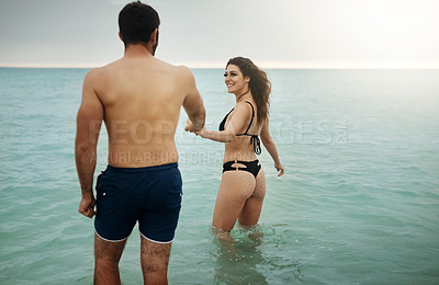 Buy stock photo Water, holding hands or happy couple at sea on vacation, adventure or holiday on valentines day. Care, walking or people with smile for bonding together in ocean for romantic trip on tropical island