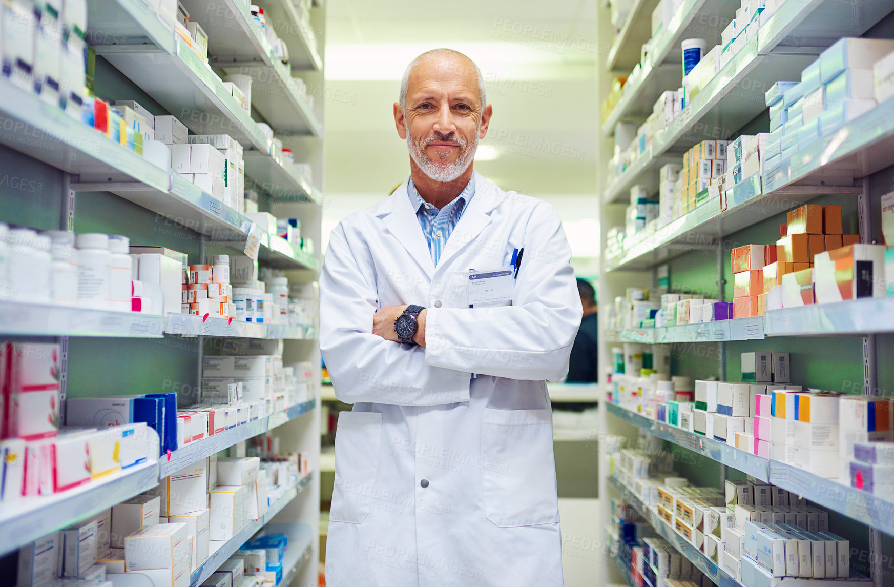 Buy stock photo Portrait of a confident mature pharmacist working in a pharmacy