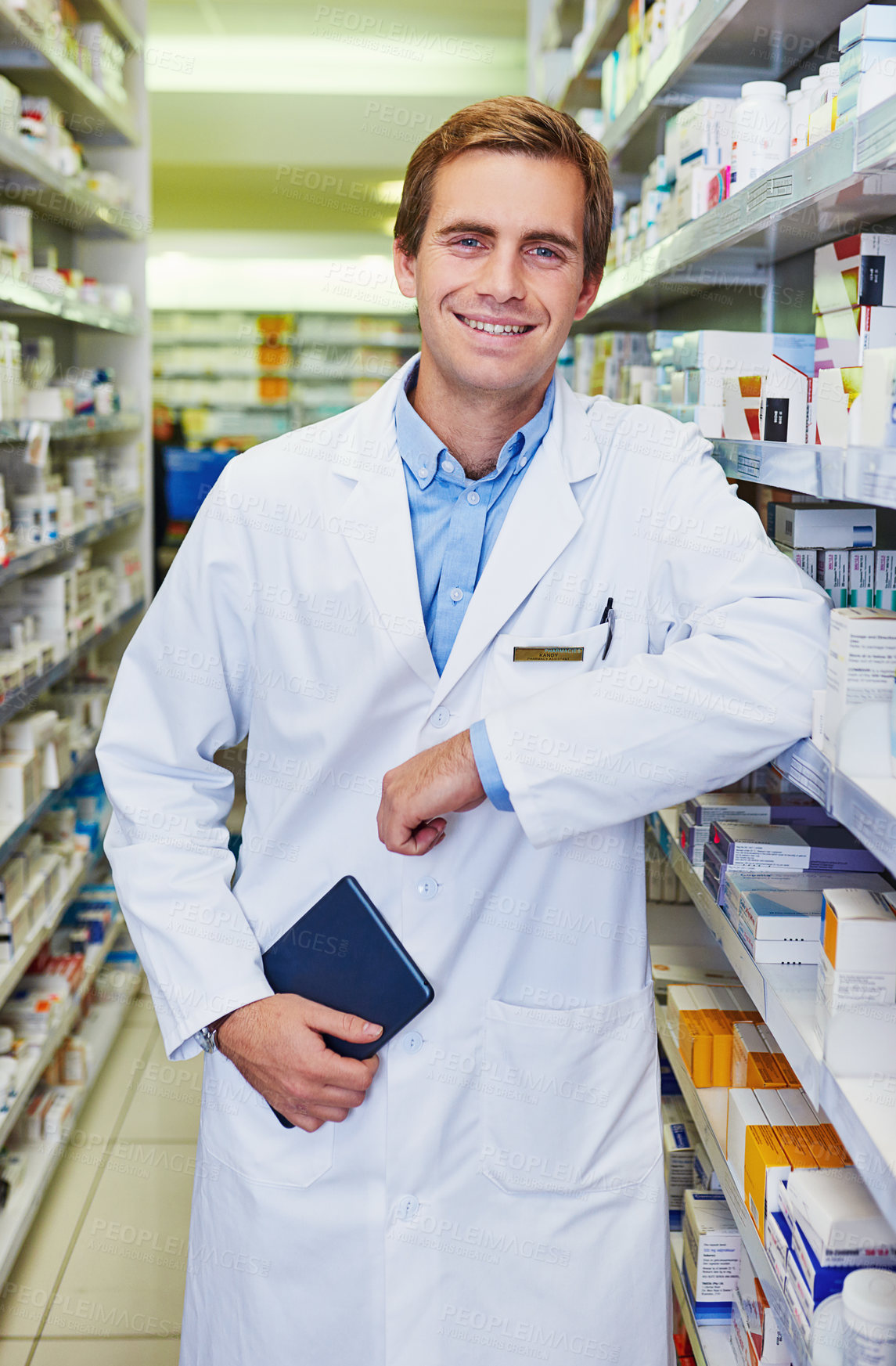 Buy stock photo Pharmacist, confident and shelf in store for medicine, inventory and trust with healthcare service. Happy man, notebook and portrait in pharmacy for wellness prescription, pills and health supplement