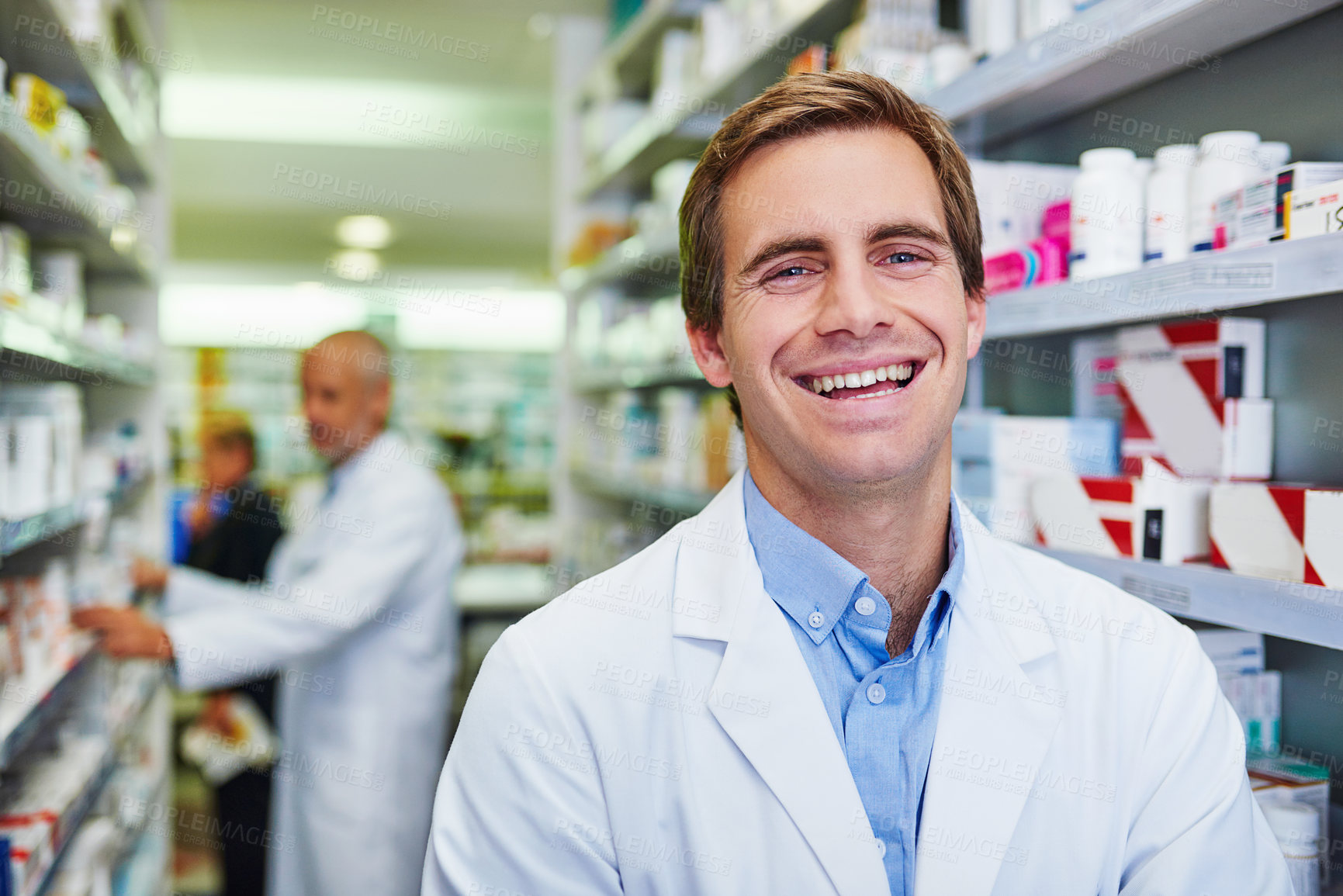 Buy stock photo Portrait of a confident young pharmacist working in a pharmacy