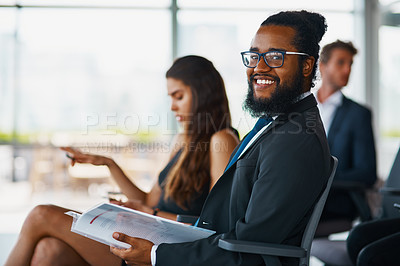 Buy stock photo Man, portrait or smile in conference for business, presentation or document in audience. Happy, investor or paperwork in seminar for proposal, funding opportunity or workshop for investment in office