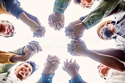 Buy stock photo Friends, support and people holding hands in circle for motivation, community and friendship outdoors. Teamwork, diversity and below of men and woman together for trust, commitment and solidarity