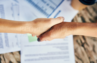 Buy stock photo Closeup shot of unrecognizable businesspeople shaking hands during a meeting outdoors