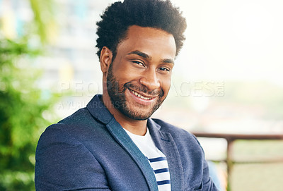 Buy stock photo Portrait of a handsome young businessman standing outdoors