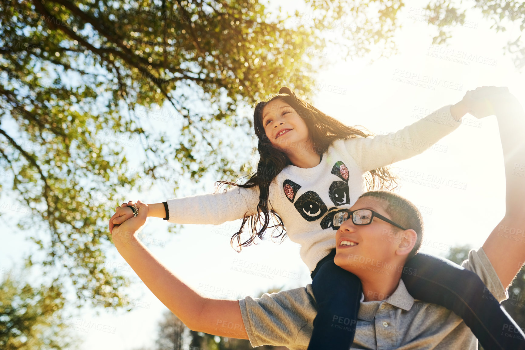 Buy stock photo Family, park and shoulder carry with teen boy, girl and sister with love and view. Low angle, care and nature together for smile, happy and kid with brother for summer vacation or holiday in forest