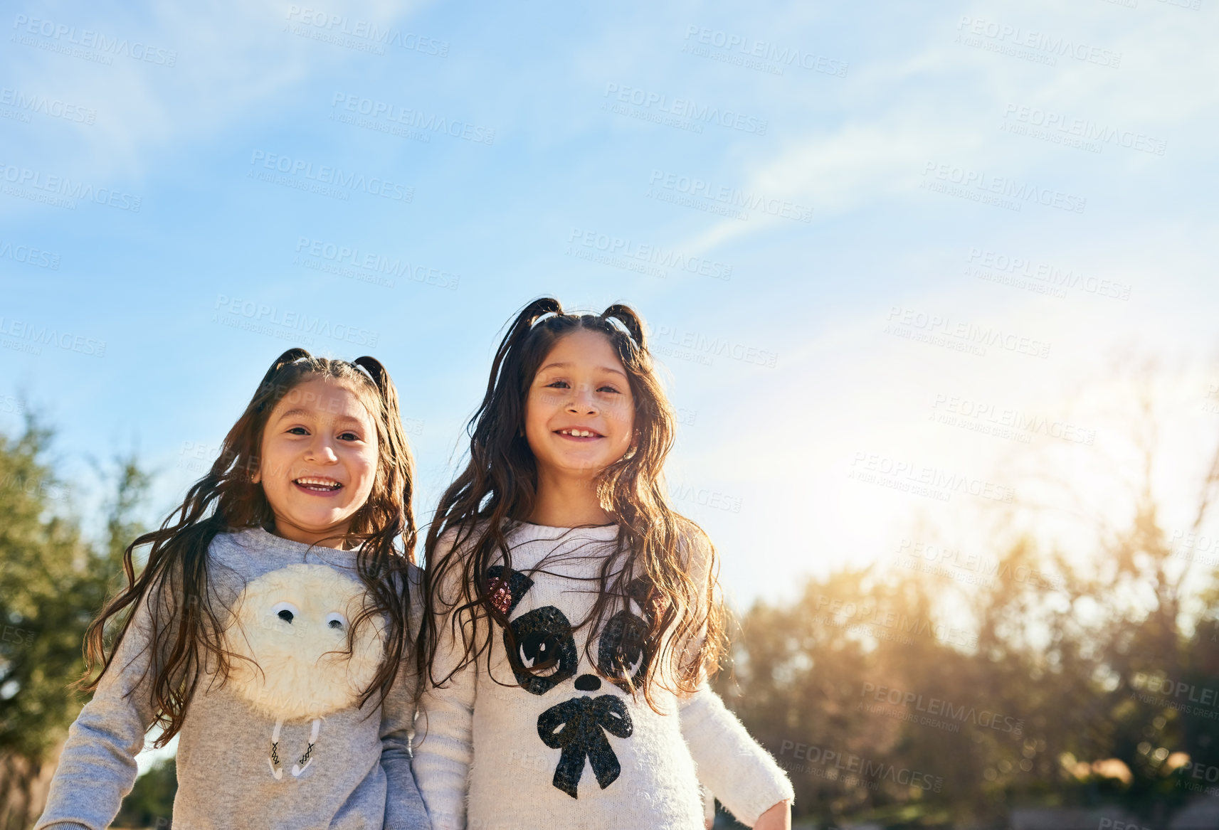 Buy stock photo Cropped shot of two adorable little girls outdoors