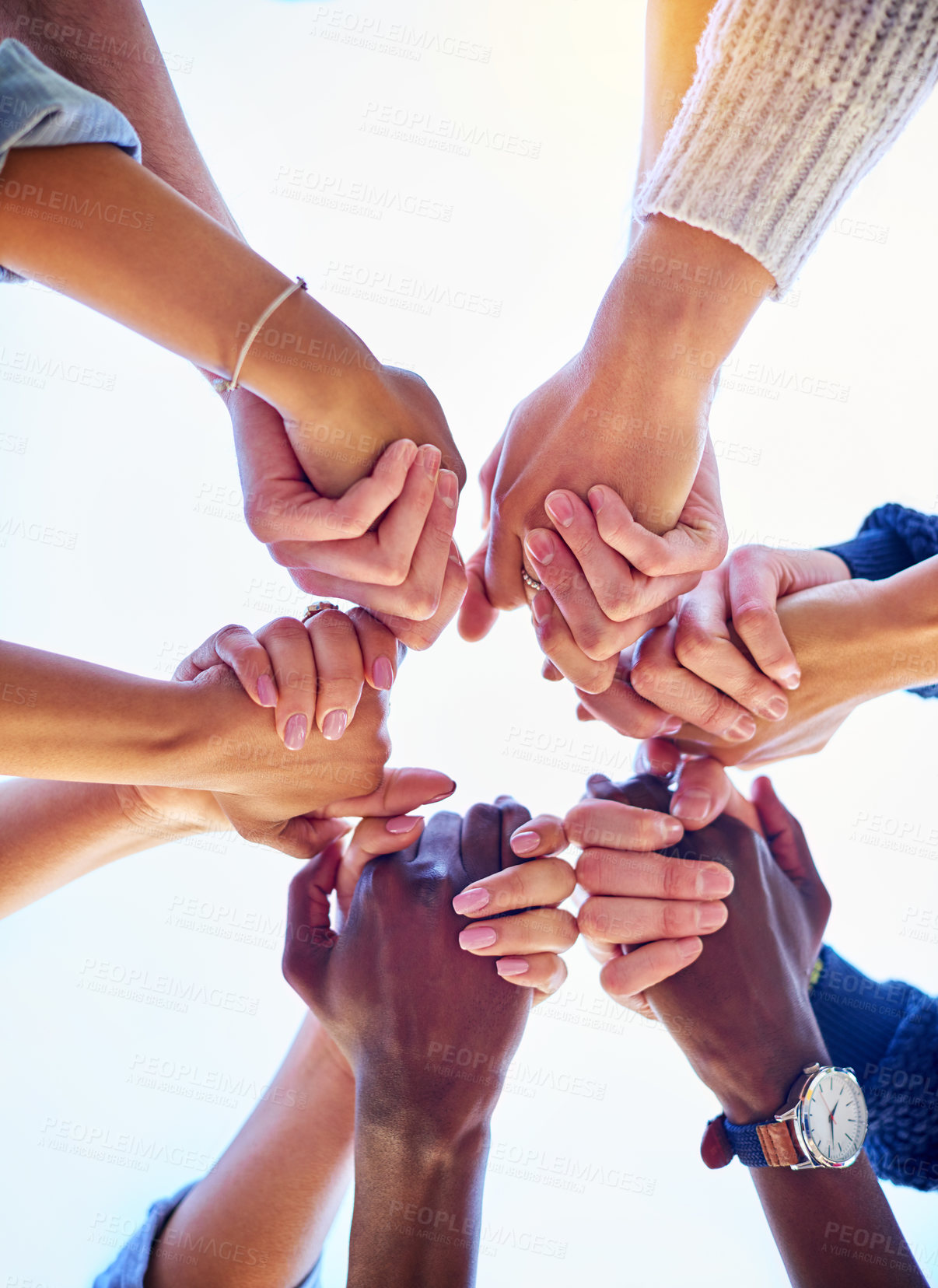 Buy stock photo Holding hands, diversity and support from below with people in nature and solidarity or trust in backyard. Community, friends and together in garden for teamwork and success or achievement outdoor