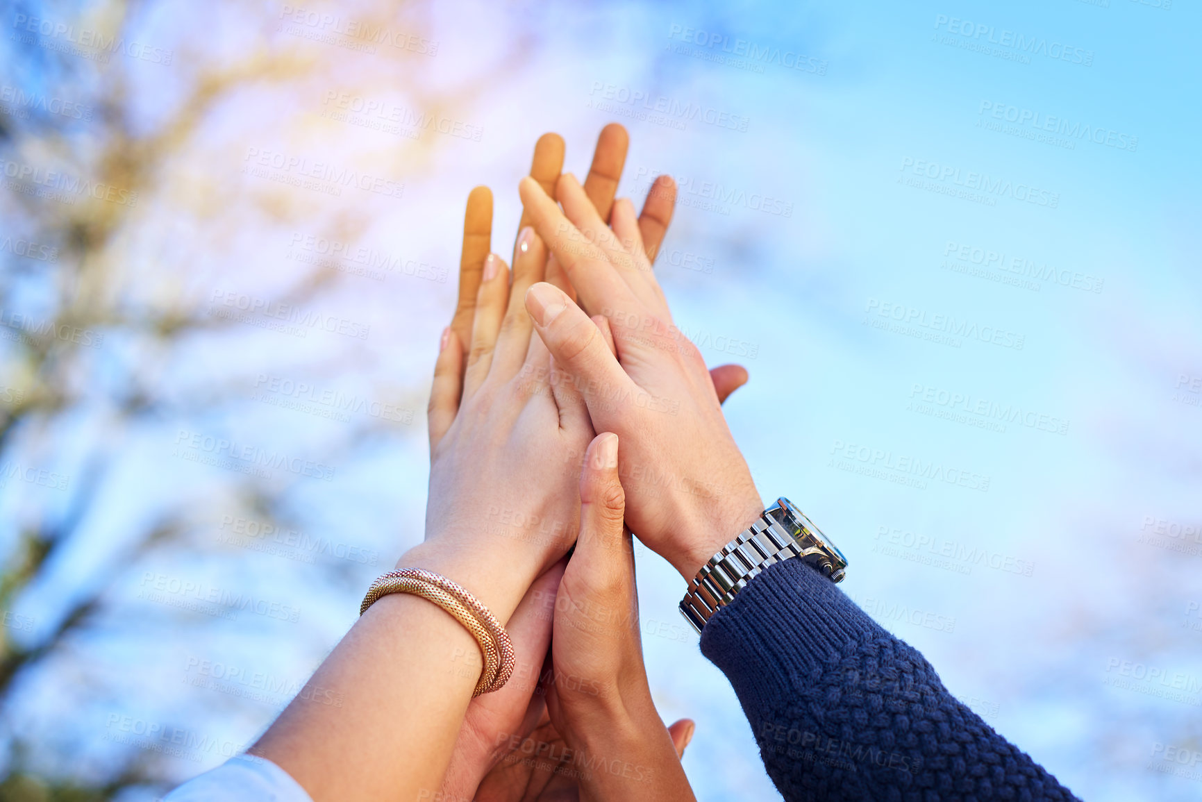 Buy stock photo High five, connection and hands for support with people in nature for solidarity or trust in backyard. Community, friends and together in garden for teamwork, motivation and success or achievement