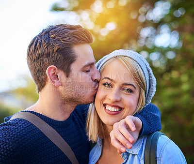 Buy stock photo Cropped shot of an affectionate young couple outside on campus
