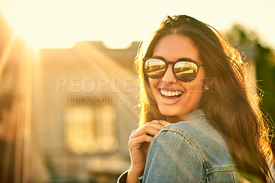 Buy stock photo Portrait of a happy and attractive young woman outdoors
