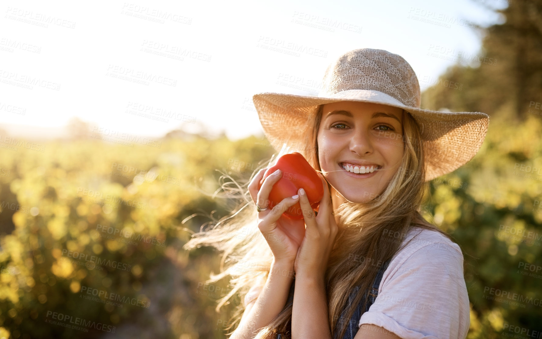 Buy stock photo Shot of a young woman working on a farm