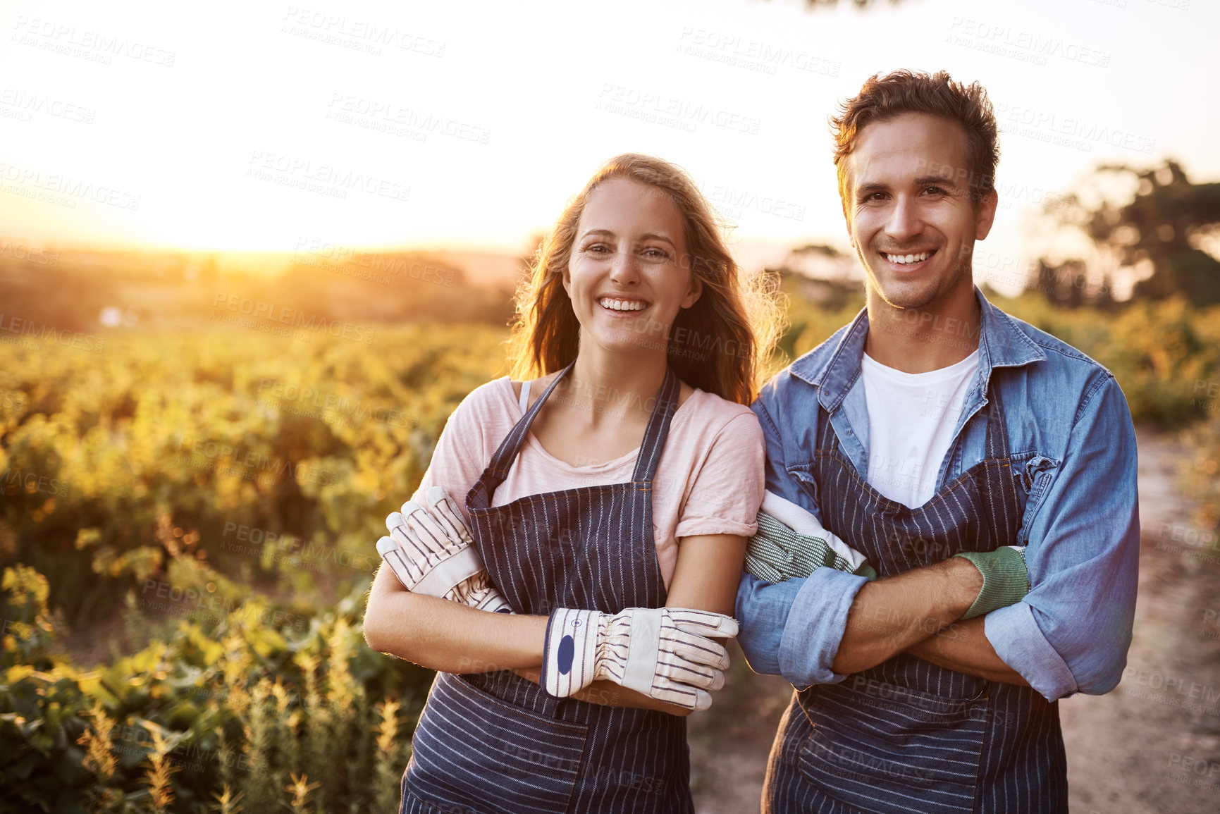 Buy stock photo Happy couple, arms crossed and portrait at farm, outdoor agriculture for plants, food and vegetables. Woman, man and together in countryside, garden or farming with happiness, start or sustainability